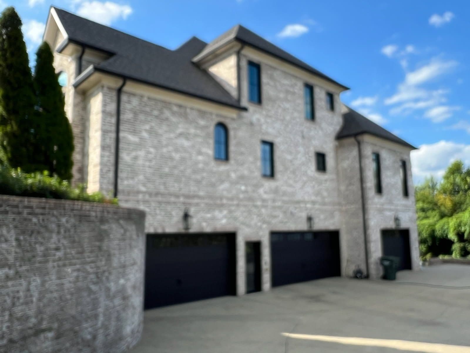 Project Black Insulated Garage Doors Enhance Home image