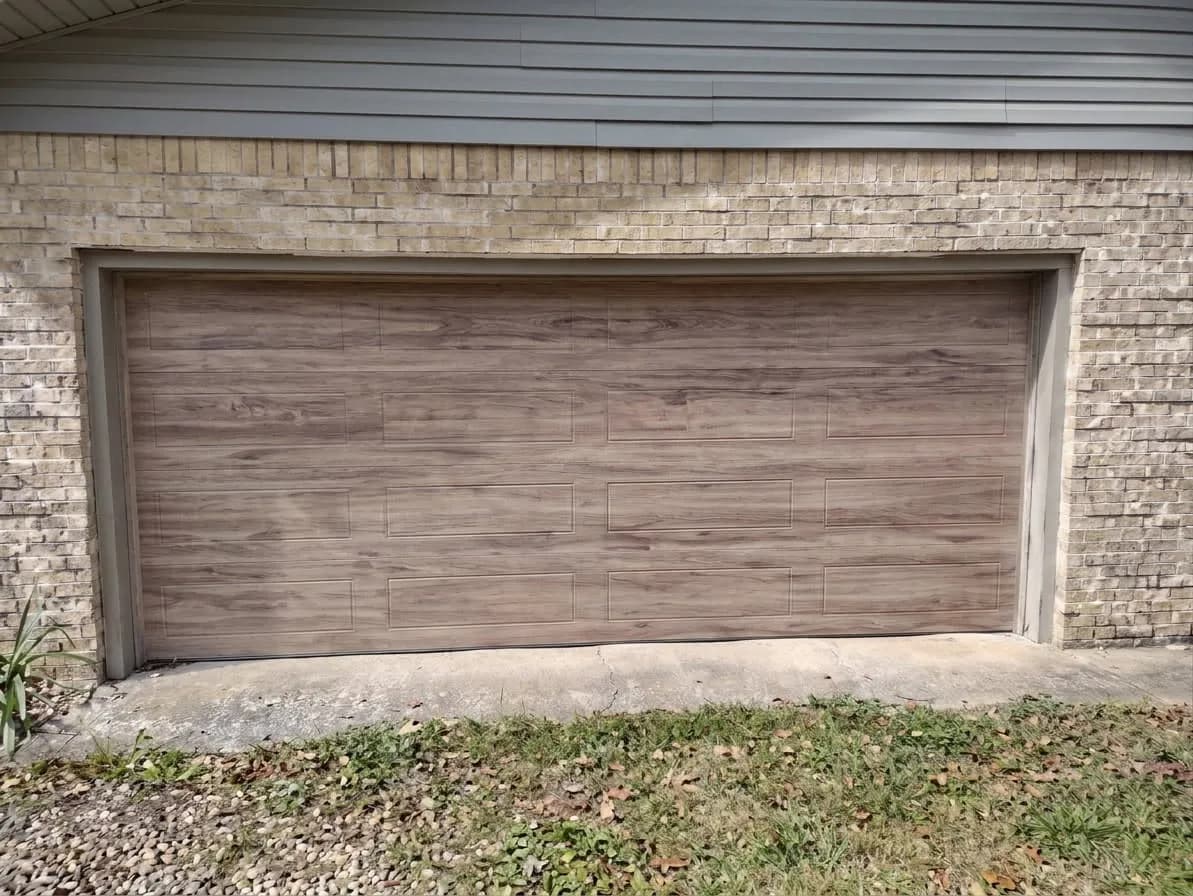 Gallery photos for Old Garage Door Out, Amarr Northwoods Steel-Back Insulated Door In: Image #1