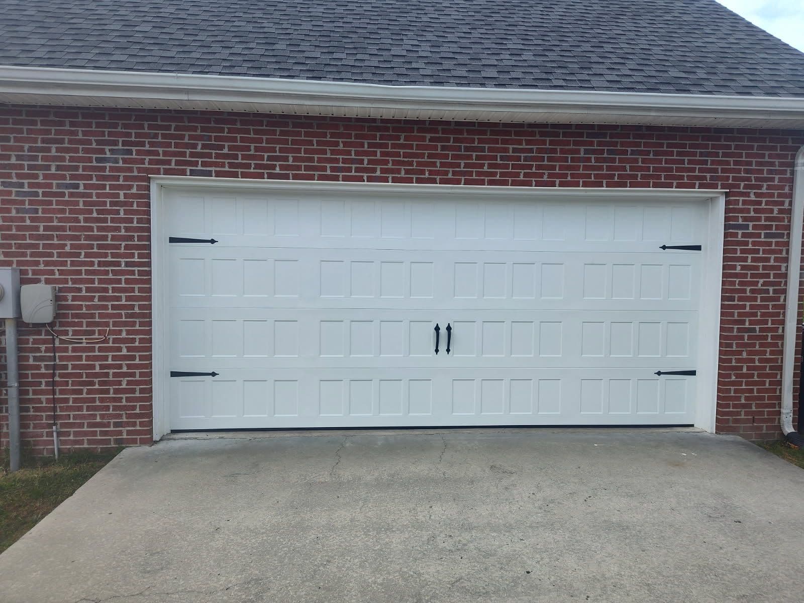 Elegant Garage Door Upgrade with Short Recessed Panels image